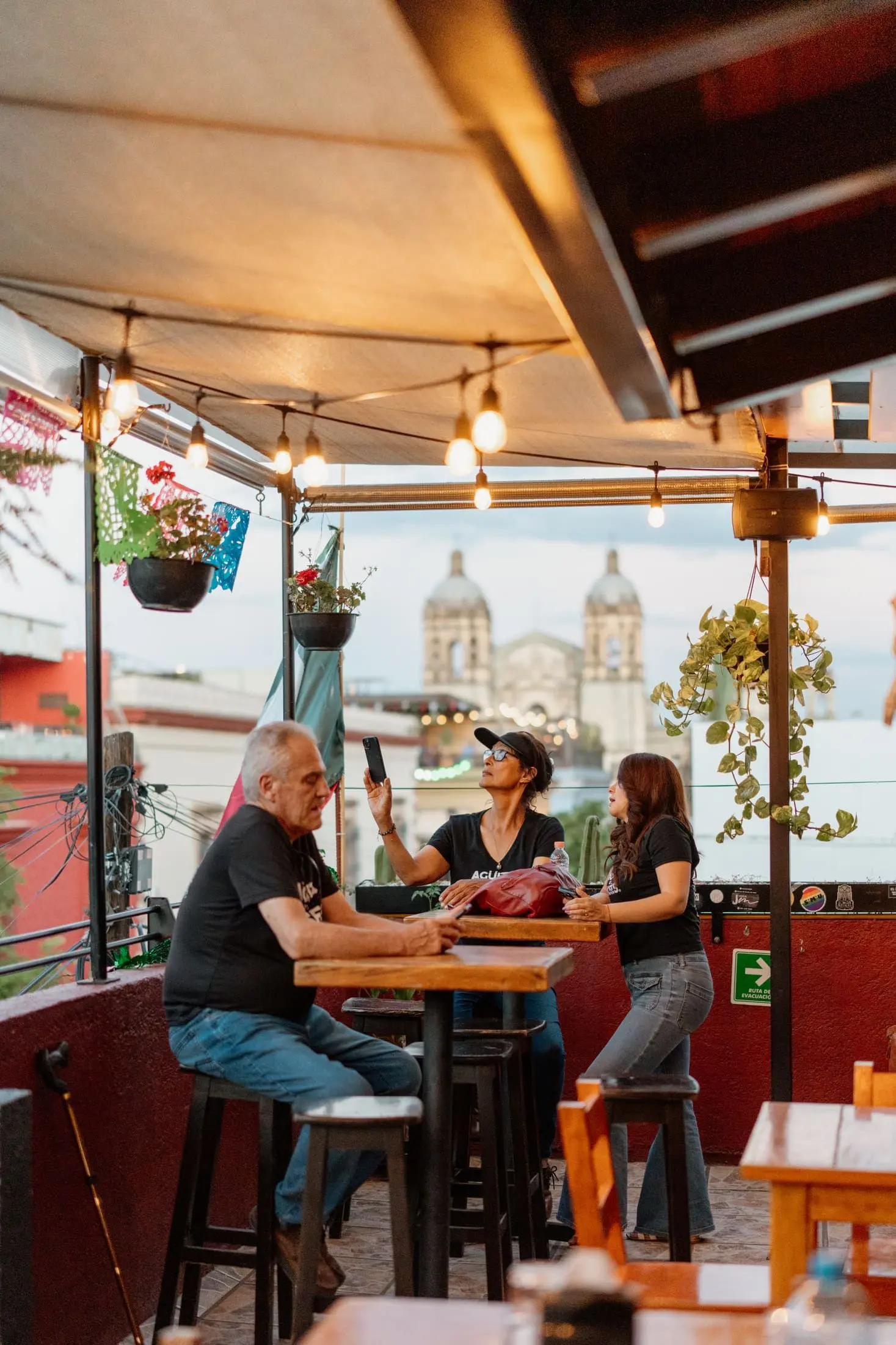 Rooftop bar atmosphere at sunset